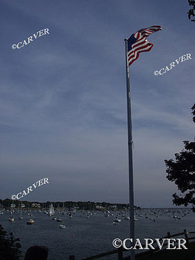 Windsnaps
A flag rippled by a stiff breeze. Marblehead harbor.
